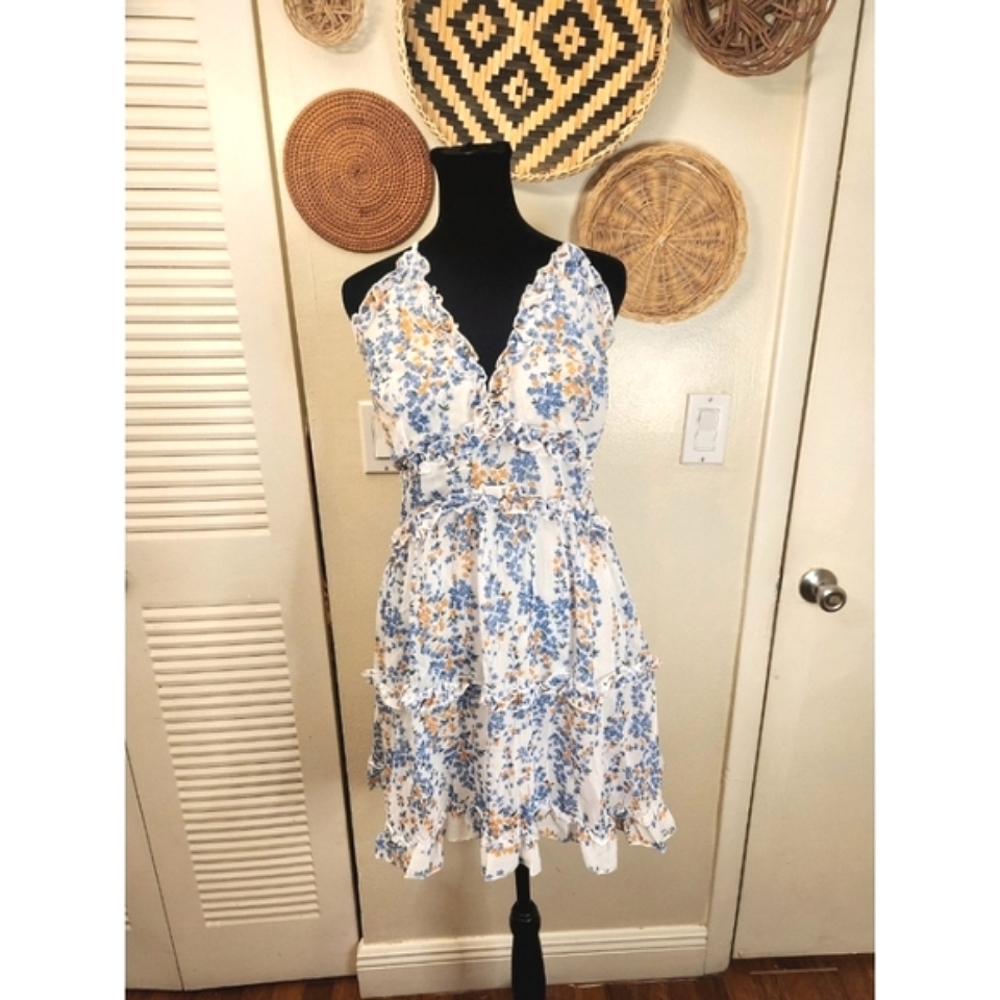 LAST ONE! Blue And White Floral Mini Dress With Ruffles And Criss-Cross Back